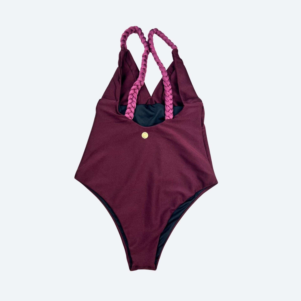 Merlot/Maroon swimsuit with pink straps on a light gray background, perfect for a chic fitness wear outfit.