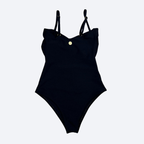 Black swimsuit with thin straps on a light gray background