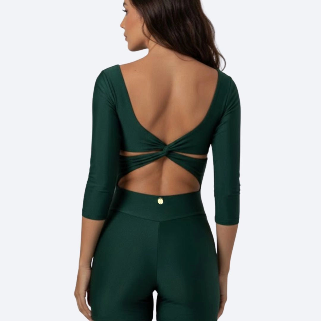 Dark green Elara activewear jumpsuit for women, medium compression, breathable fabric, perfect for gym, pilates, and yoga.