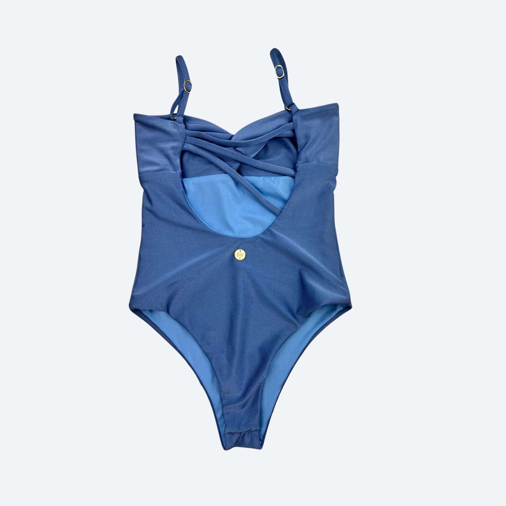 Blue women’s Swimsuit with thin straps for beach or gym, displayed on a light gray background