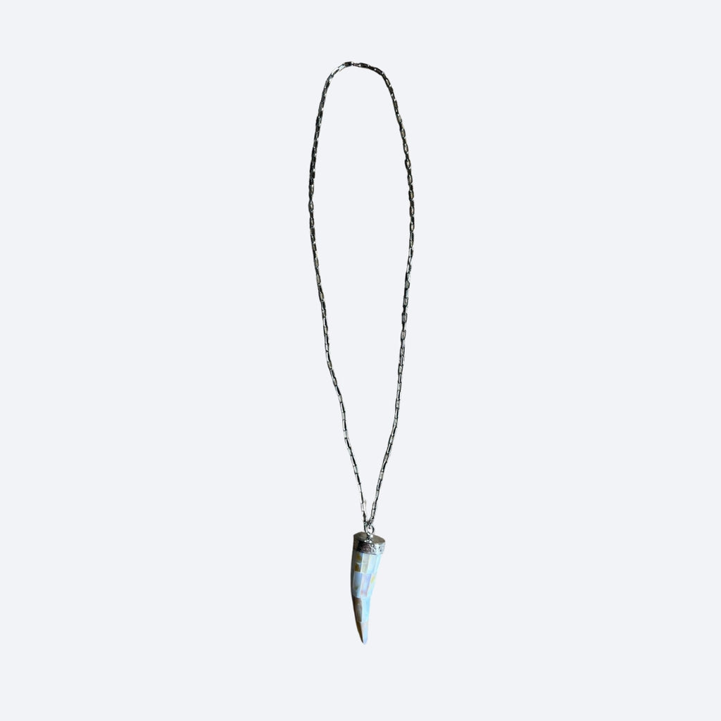 Necklace with a unique pendant on a light gray background