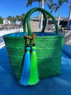 Tropical Charm Green Grass Handwoven Straw Bag – Brazilian Artisanal Design with Aqua Blue & Neon Tassels