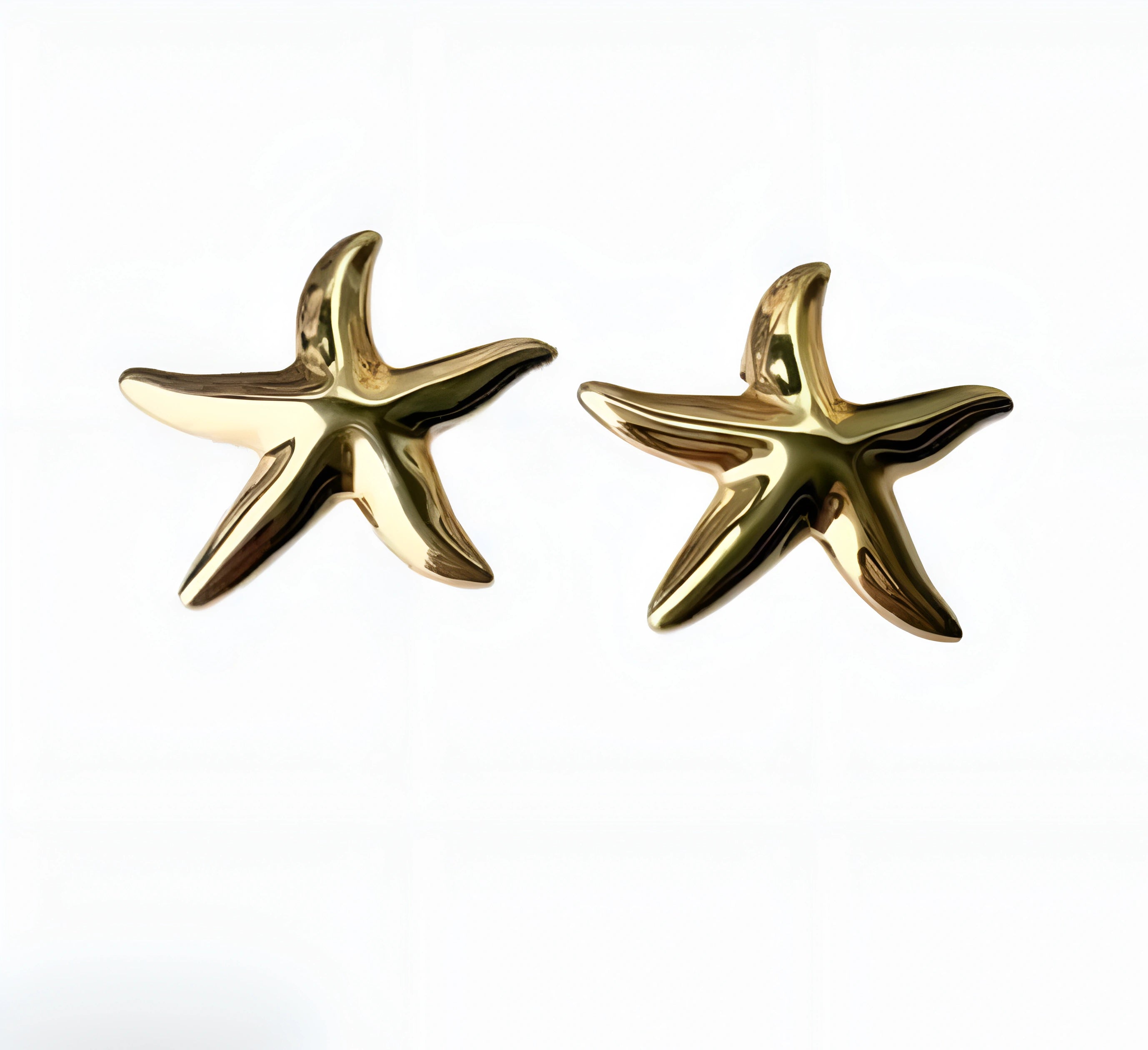 Gold starfish statement earrings with polished gold-tone finish, ocean-inspired coastal jewelry